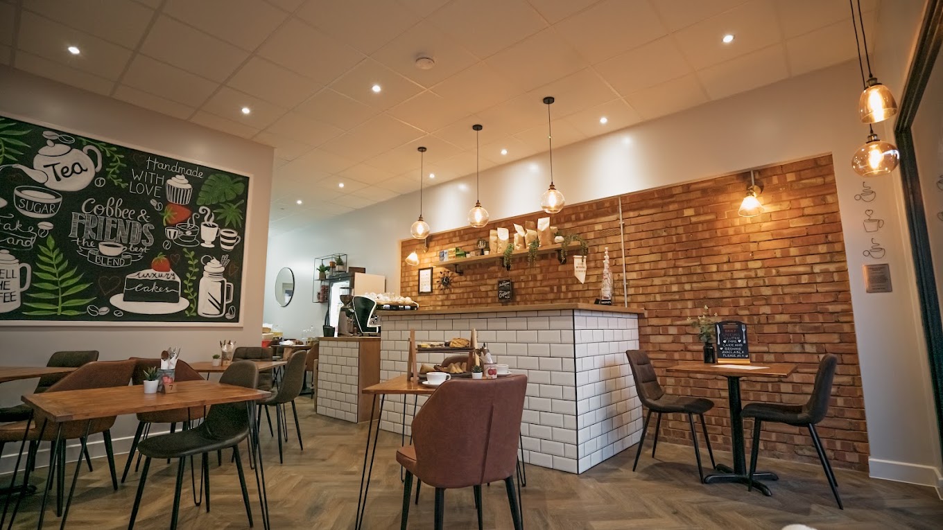 Inside Coffee At The Close, showing the seating area and counter